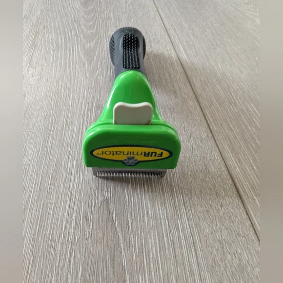 FURminator Black and Green Grooming Tool