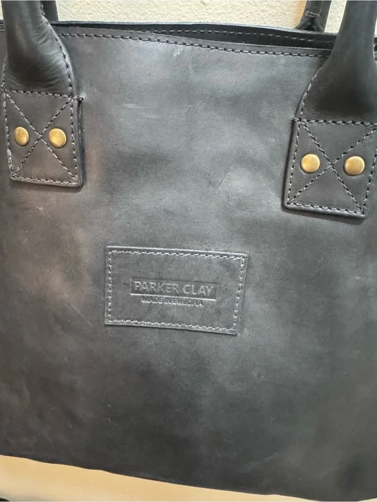 Parker Clay Merkato Signature Leather Tote Bag in black.