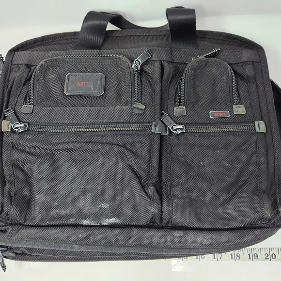 TUMI Black Briefcase with Durable Design