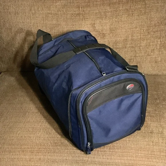 American Tourister Navy collapsible duffle bag