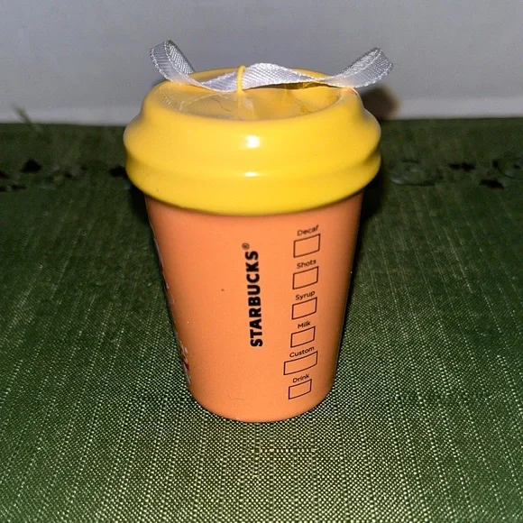 Starbucks Yellow and Orange Epcot Xmas Ceramic Ornament