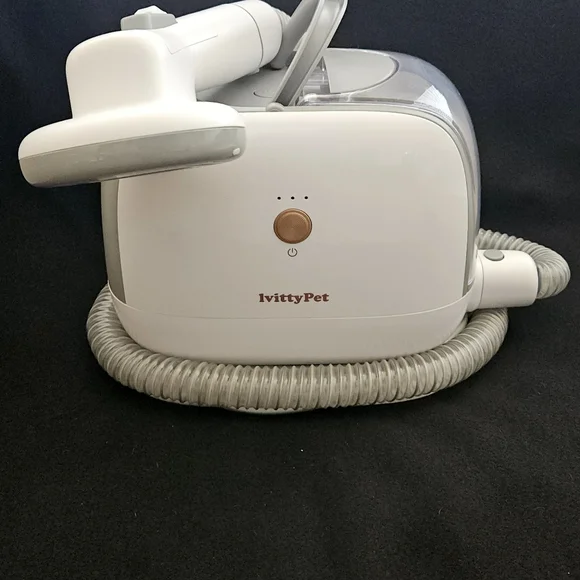 Grooming and drying vacuum