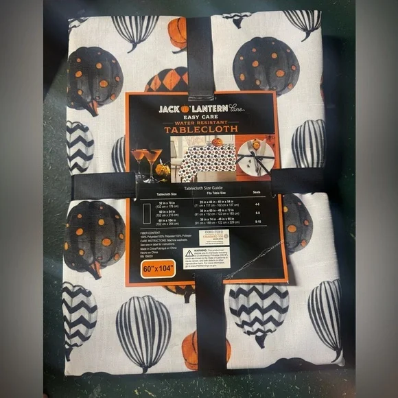 Jack O' Lantern Lane 60” x 104” Tablecloth with Orange and Black Pumpkins