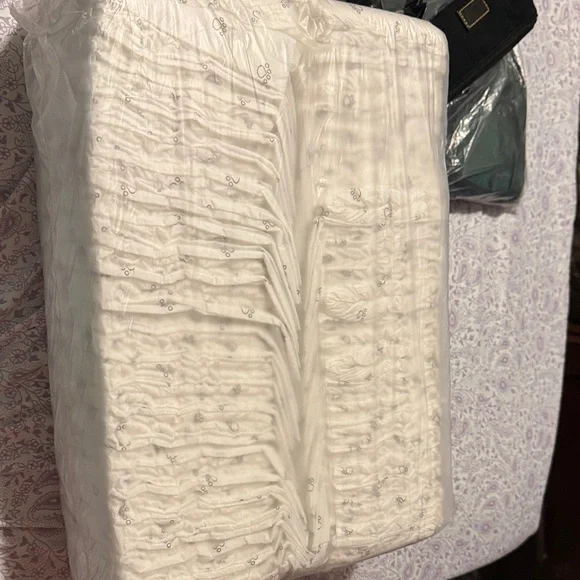White Ruched Fabric with Embellishments