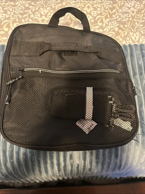 Foldable duffle with wheels.