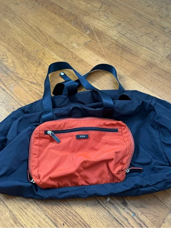 Tumi Duffel Bag with Orange Front Pocket