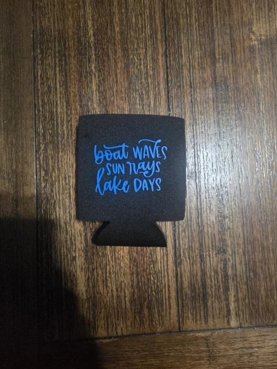 Boat Waves Sun Rays Lake Days Foam Can Cooler - Black with Blue Text