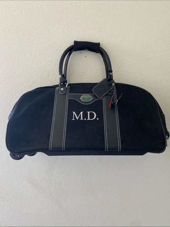 Sovrano Black Novohyde Leather Wheeled Duffel Bag with Hideaway Handle NWOT