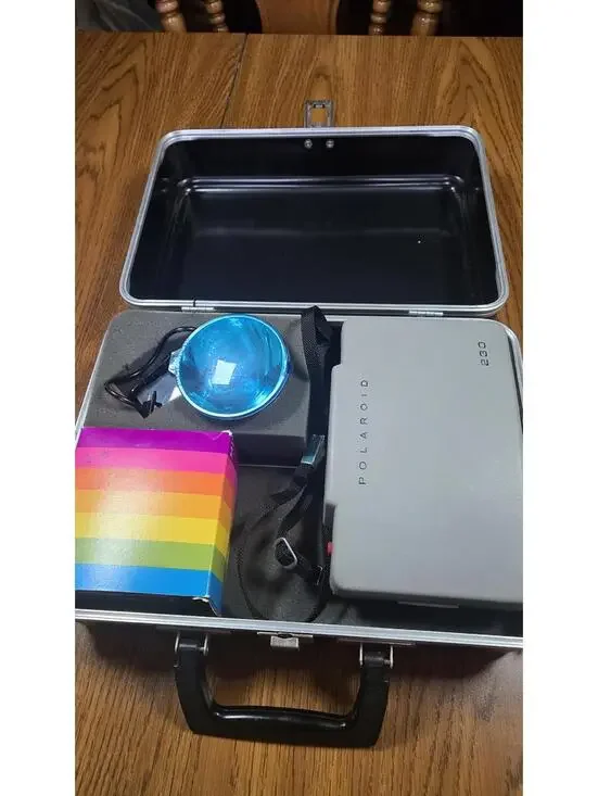 Polaroid 230 Instant Camera with Carrying Case and Accessories