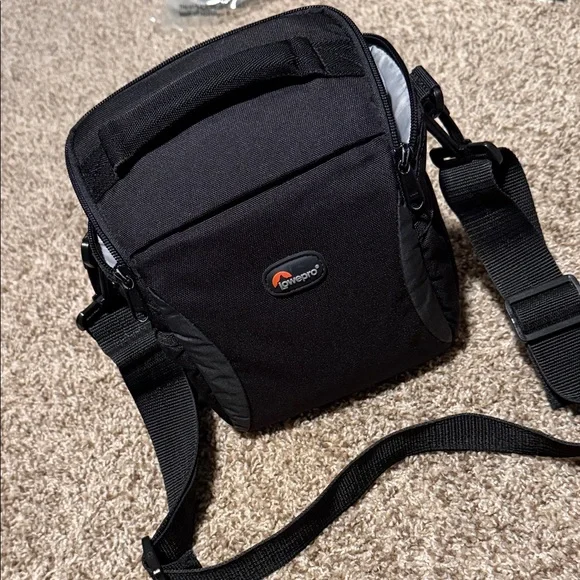 Lowepro Format 140 padded camera case w/handle & shoulder or crossbody strap