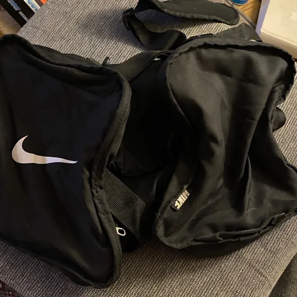 Nike Black duffel bag with White Swoosh Logo 3:8