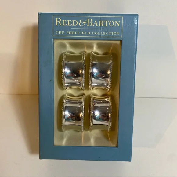 NIB Set Of 4 Reed & Barton Silver Plate Napkin Rings