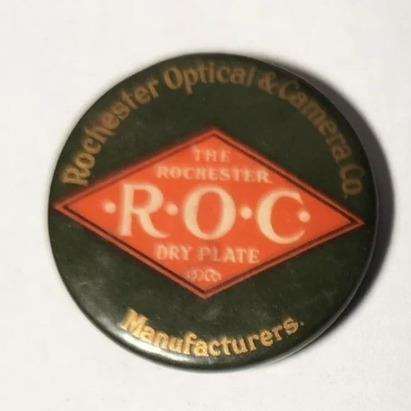 Antique 1896 ROC ROCHESTER Optical and Camera Advertising Pinback Pin