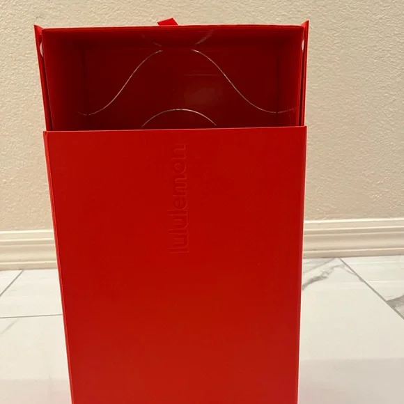 Lululemon — Vibrant Orange Decorative Gift Box.