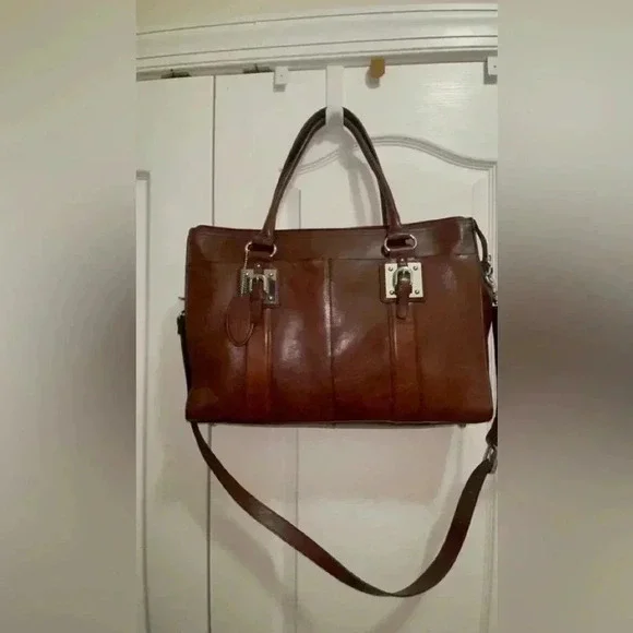 Wilson leather original back, rown color great conditions with adjstbel strap