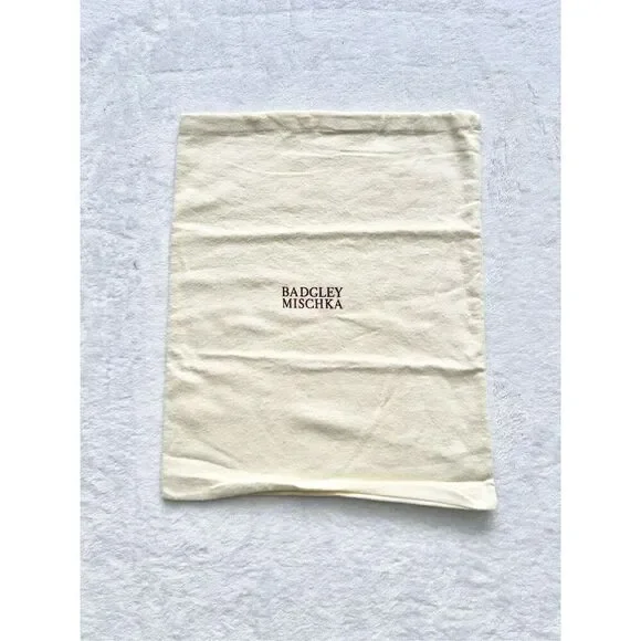 BADGLEY MISCHKA cream colored dust bag ￼