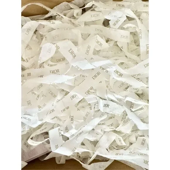 Handful of Dior shredded tissue paper ￼
