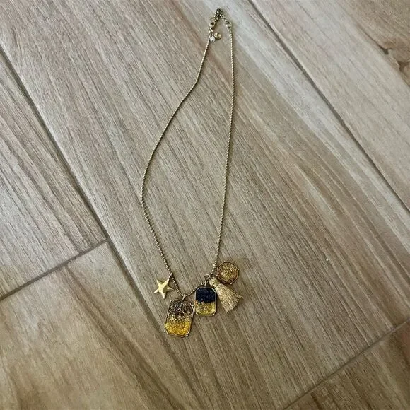 Gold-Tone Necklace with Star & Tassel Charms