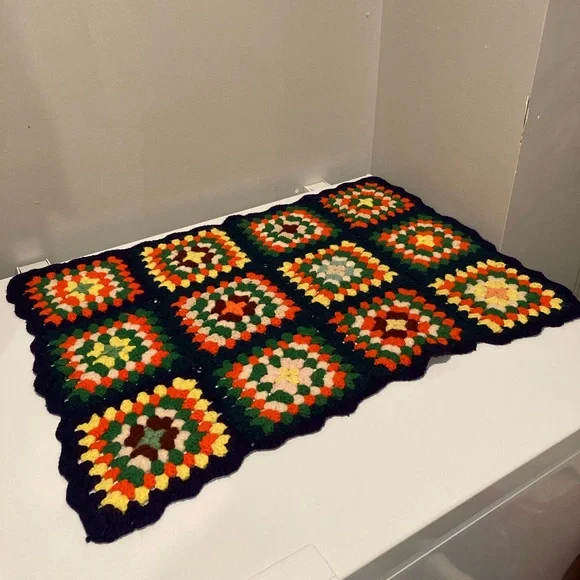 Vintage handmade granny square baby blanket