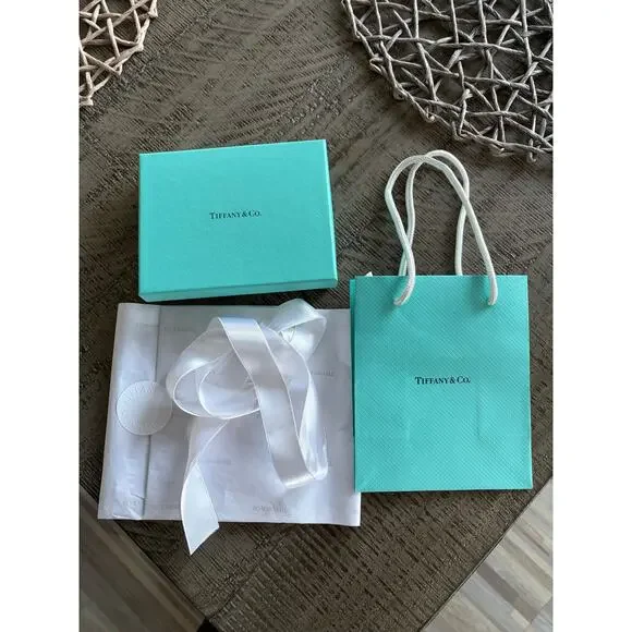 Tiffany & Co. blue giftbox, giftbag, Tiffany tissue and ribbon