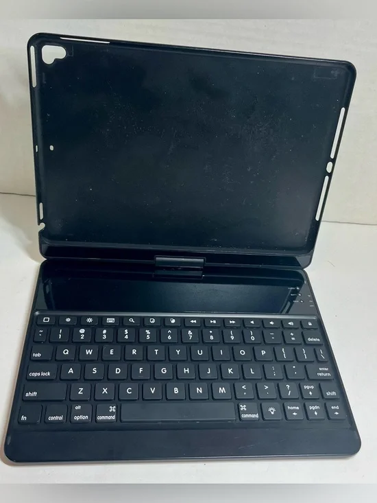 WIRELESS KEYBOARD FOR IPAD/NOT TESTED - NO CHARGER - ALSO CAN BE USED FOR PARTS
