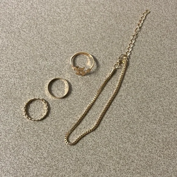 4/$20 bundle and save Gold Toned Layered Ring & Chain Bracelet Set