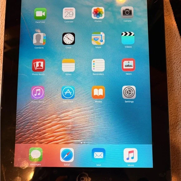 iPad 2 - Silver with Black Frame. Pre owned in good condition. Good for kids