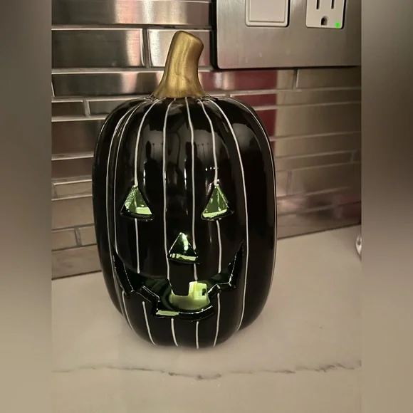 Target bullseye’s playground ceramic LED light up pumpkin. Black w/white stripes