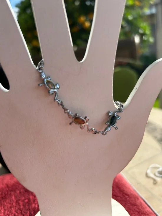 Small Silvertone Multi-Color Turtle Link Bracelet. Used some damage see pictures