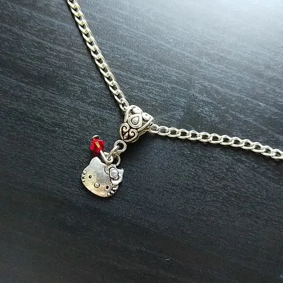 Anklet, Hello Kitty Silver tube bail red bead 12