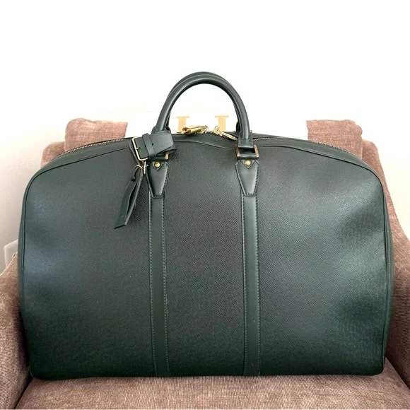Authentic Louis Vuitton Epicea Taiga Leather Helanga En Poche Travel Bag M30104