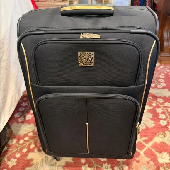 Anne Klein Classic Black and Gold Travel Roller Luggage