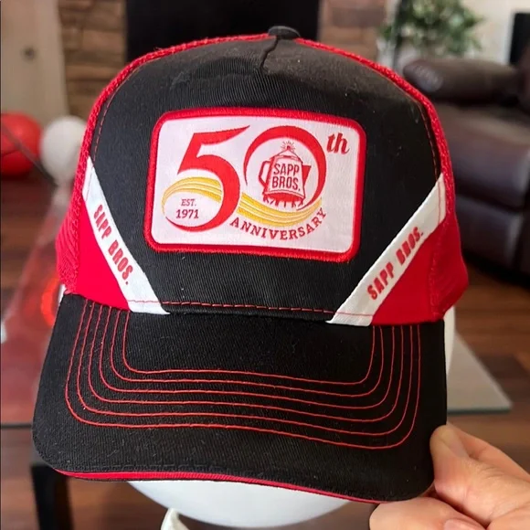 Bold Red and Black Party Hat with Dynamic Design