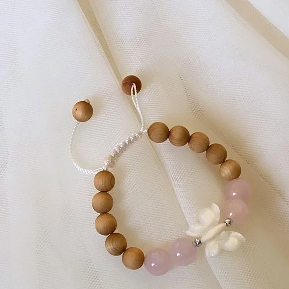 A rose Quartz and butterfly kid’s bracelet