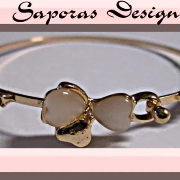 Gold Tone Bangle Bracelet With Bow & Heart Design White Beads & Clear Crystals