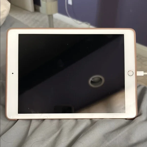 Gold and White Tablet with Sleek Design - 4th generation