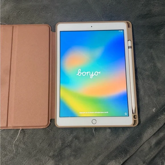 iPad 7th generation rose gold. Comes with velvet caviar case and Apple pen.