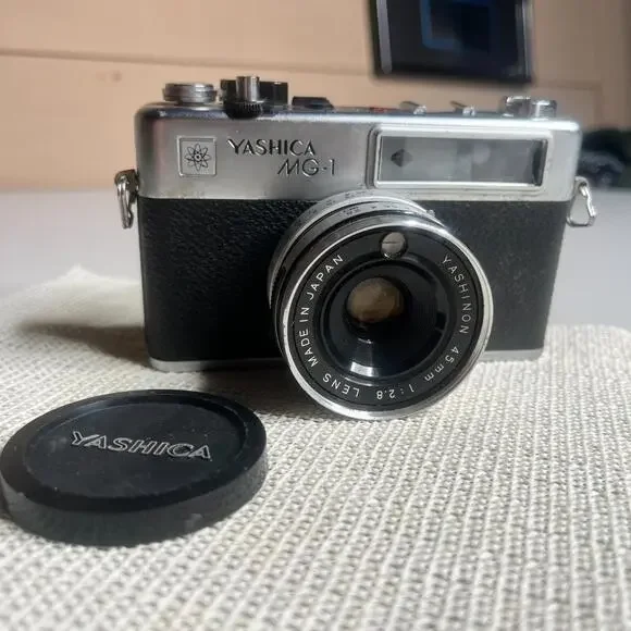 Yashica MG-1 35mm Rangefinder Film Camera 45mm f/2.8 Lens Made in‎ Hong Kong Cap