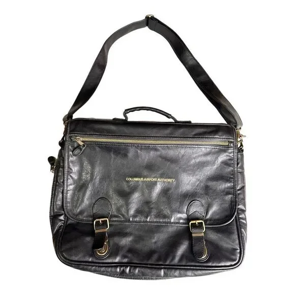 Large leather travel/work bag black with lots of pockets adjustable shoulder str