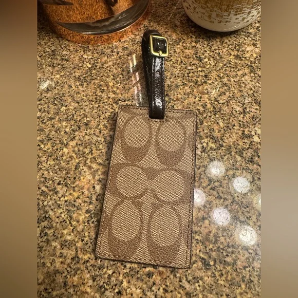 Coach signature Brown Patterned‎ Luggage Tag New With Tags