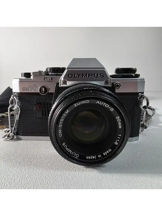 Olympus OM10 With Zuiko 50mm F1.8 Lens W/Neck Strap & Manual