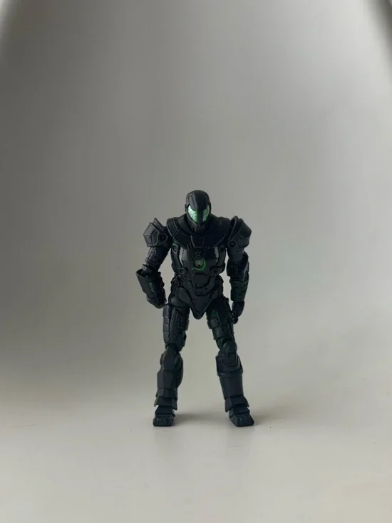 Hasbro Black and Green Armored Action Figure