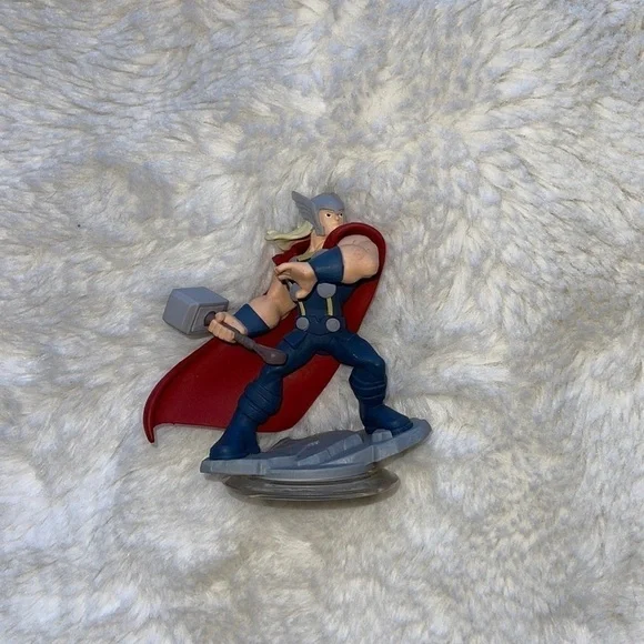 Disney action figure Thor unboxed only used as display New no damage no tags