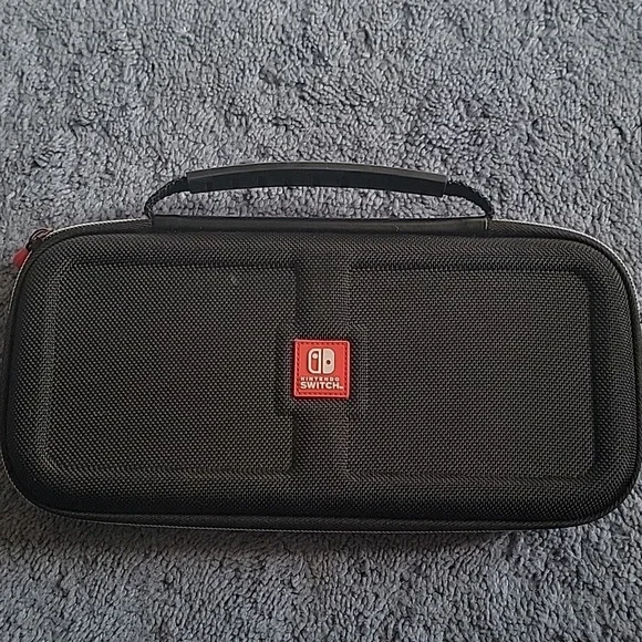 Nintendo Switch Game Traveler Deluxe Case, black, gently used.