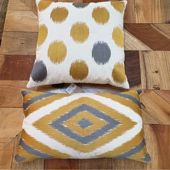 Two West Elm Gold and Gray Patterned Accent Pillows