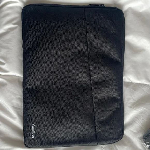 Tablet case. New in package. Black. Guaiboshi