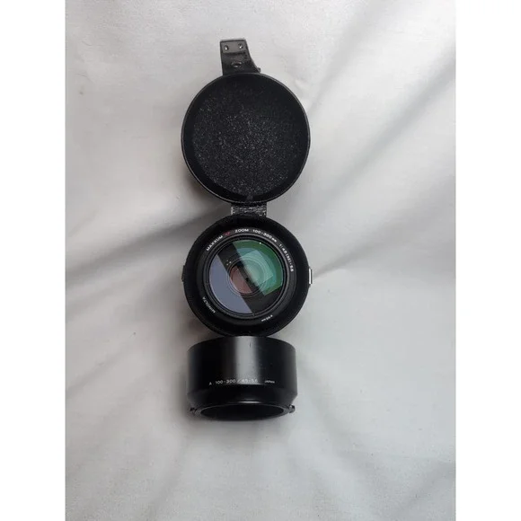 Minolta Xi AF 100-300mm 1: 4.5-5.6 Power Zoom Lens And Case