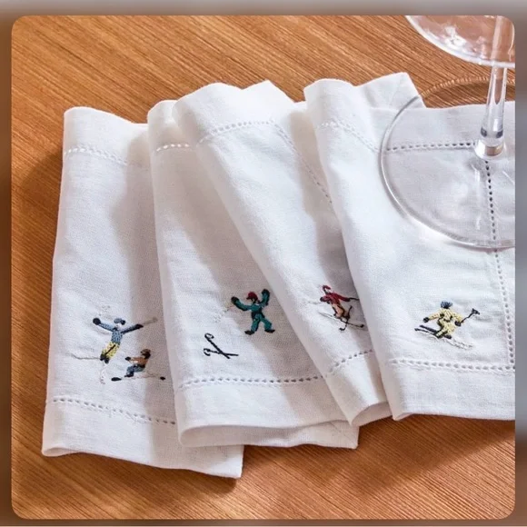 West Elm (St . Jude) Holiday skiers Embroidered Cocktail Napkins set