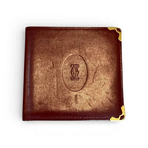 Cartier Men’s Deep Red Leather Bifold with Gold Corners