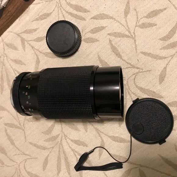 VIVITAR MICRO FOCUSING ZOOM LENS w/padded bag for travel or storage.